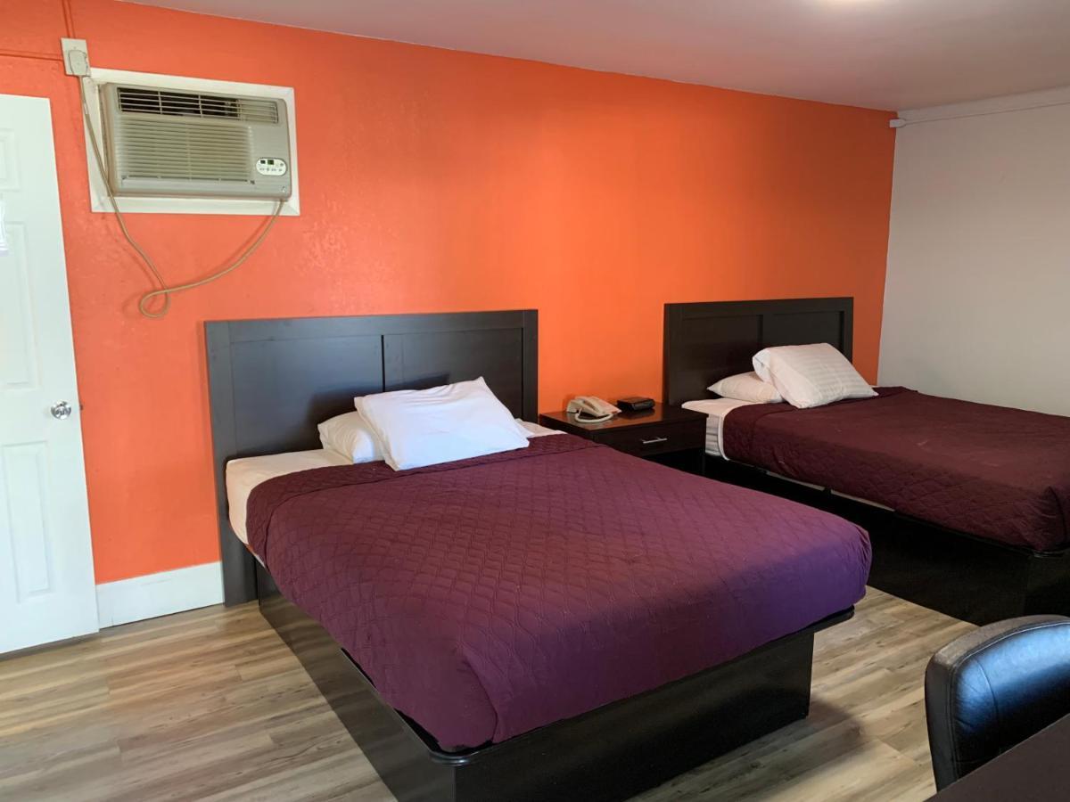 Whispering Pines Motel *